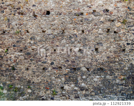 medieval stone masonry of castle wall. grunge architectural background 112921339