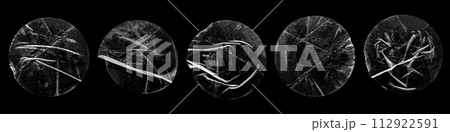 transparent adhesive round plastic sticker label set isolated on black background 112922591