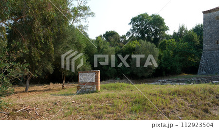 Ruins of Great Basilica in Butrint National Park, Buthrotum, Albania. Triconch Palace at Butrint Life and death of an ancient Roman house Historical medieval Venetian Tower surrounded. High quality 112923504