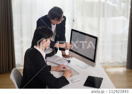 Professional businessman discussing project developing financial research at office Professional businessman discussing project developing financial research at office 112923843