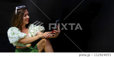 attractive female reacts to a text message 112924055