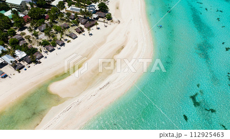 Aerial drone of tropical island and a beautiful beach. Bantayan island, Philippines. Aerial drone of tropical island and a beautiful beach. Bantayan island, Philippines. 112925463