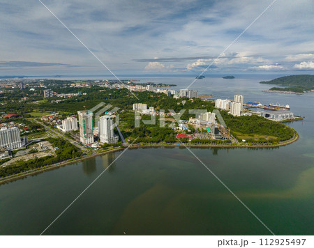 Aerial view of panorama of Kota Kinabalu city with modern buildings. Borneo,Sabah, Malaysia. 112925497