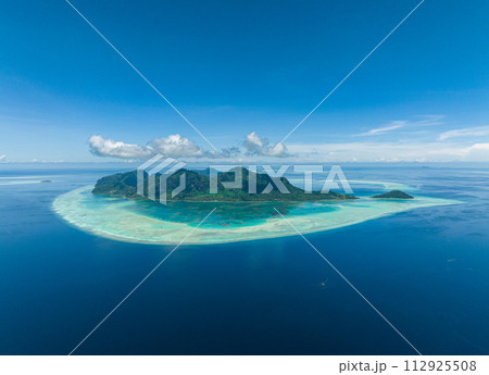 Top view of tropical islands and blue sea against the sky and clouds. Tun Sakaran Marine Park, Sabah, Malaysia. 112925508