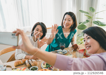 a forty-something woman a forty-something woman 112926546