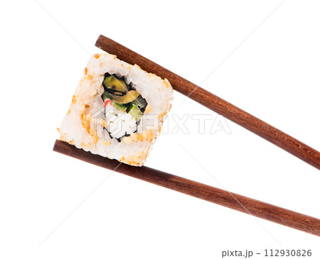 Sushi Sushi in chopsticks Sushi Sushi in chopsticks 112930826