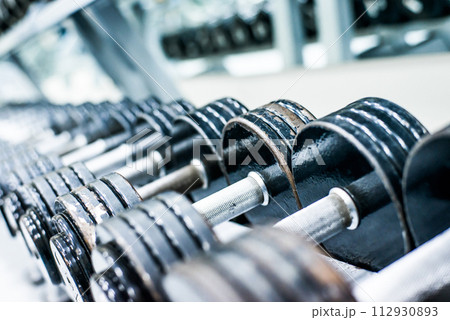 Sports dumbbells 112930893