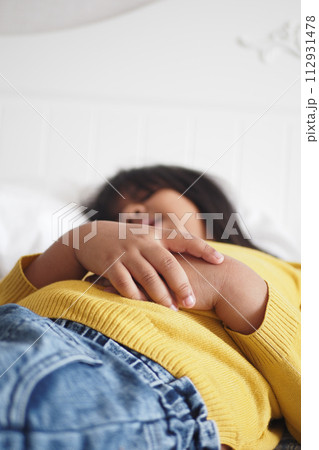 a child sleeping in bed, selective focus . a child sleeping in bed, selective focus . 112931478