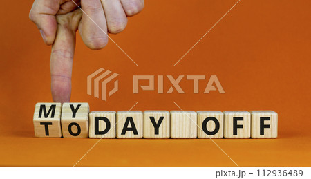 Today is my day off symbol. Businessman turns cubes and changes concept words Today off to My day off. Beautiful orange background, copy space. Business motivation today is my day off concept. Today is my day off symbol. Businessman turns cubes and changes concept words Today off to My day off. Beautiful orange background, copy space. Business motivation today is my day off concept. 112936489