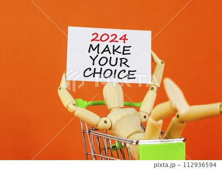 2024 Make your choice symbol. Concept words 2024 Make your choice on beautiful white paper. Beautiful orange background. Voter model. Business 2024 Make your choice concept. Copy space 112936594
