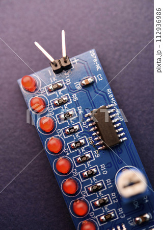 A printed circuit board with radio elements. LEDs and chips. A set for soldering an amateur radio. A printed circuit board with radio elements. LEDs and chips. A set for soldering an amateur radio. 112936986