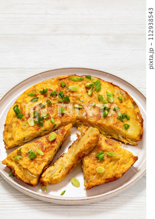 spanish potato omelette tortilla espanola on plate 112938543