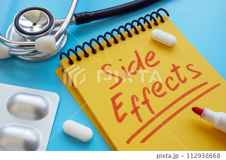 Medical pills and handwritten note side effects. Medical pills and handwritten note side effects. 112938668