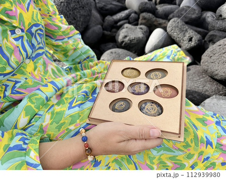 Healing crystals on brown background 112939980