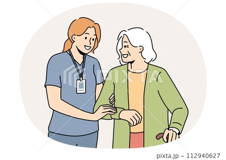 Caregiver help elderly woman with walking Caregiver help elderly woman with walking 112940627