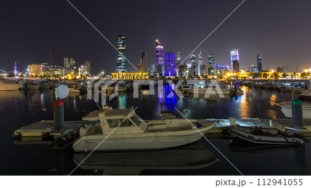 Yachts and boats at the Sharq Marina night timelapse hyperlapse in Kuwait. Kuwait City, Middle East Yachts and boats at the Sharq Marina night timelapse hyperlapse in Kuwait. Kuwait City, Middle East 112941055