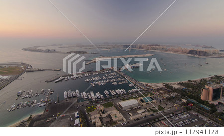 Aerial view from Dubai Marina panorama from day to night transition timelapse 112941128