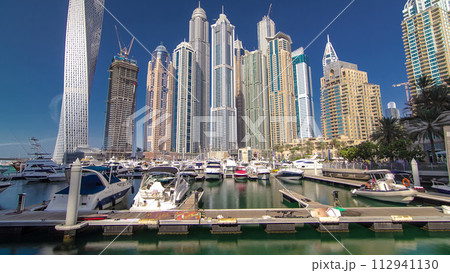 Dubai Marina with skyscrapers and boats Hyperlapse Dubai Marina with skyscrapers and boats Hyperlapse 112941130