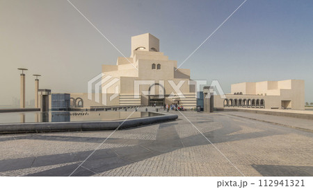 Qatar's museum of Islamic Art timelapse hyperlapse on its man-made island beside Doha Corniche Qatar's museum of Islamic Art timelapse hyperlapse on its man-made island beside Doha Corniche 112941321