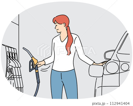 Woman fuel car at gas station 112941404