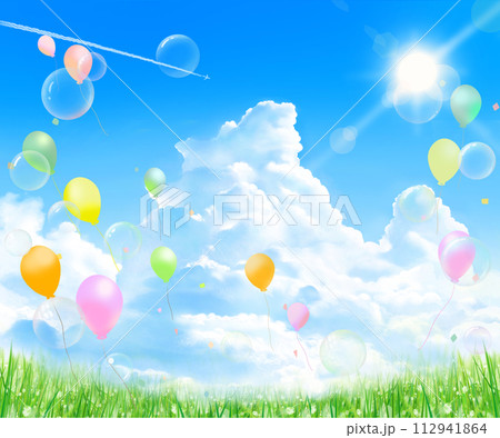 太陽の光が差し込む雲のある青空に舞い飛ぶ風船とシャボン玉の新緑フレーム背景素材 112941864