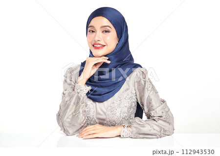 Beautiful young asian muslim woman wearing a blue hijab on white background, Beautiful young asian muslim woman wearing a blue hijab on white background, 112943530