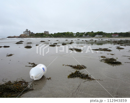 Plastic bottle on Good Harbor Beach, Gloucester, Massachusetts 112943859