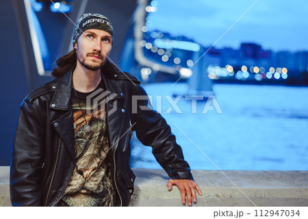 The guy in the leather jacket and bandana 112947034