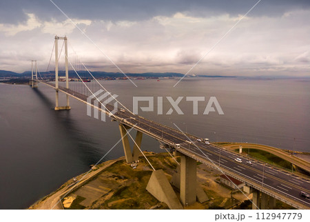 Osman Gazi Bridge spanning the Izmit Gulf, Turkey. 112947779