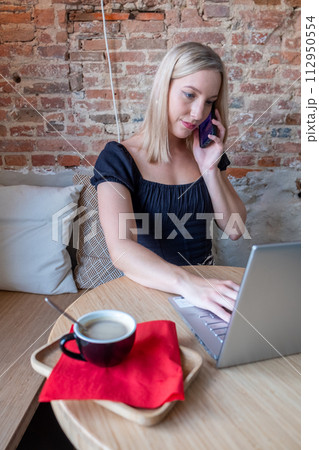Multitasking Maven: Young Professional Balancing Work and Communication 112950554