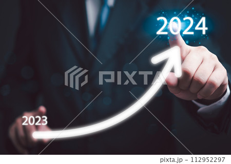 loading progress bar to 2024 Businessman tounching arrow investment and planning marketing finance and target growth success.. loading progress bar to 2024 Businessman tounching arrow investment and planning marketing finance and target growth success.. 112952297