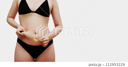 Women body fat belly. Obese woman hand holding Women body fat belly. Obese woman hand holding 112953229