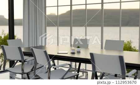 The interior design of a contemporary spacious meeting room with a meeting table. 112953670