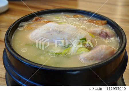 Samgyetang is a traditional Korean soup for health made from chicken 112955040