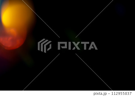 Multicolored bright highlights on a black background. for overlay to create a festive, vibrant effect, abstract background Multicolored bright highlights on a black background. for overlay to create a festive, vibrant effect, abstract background 112955837