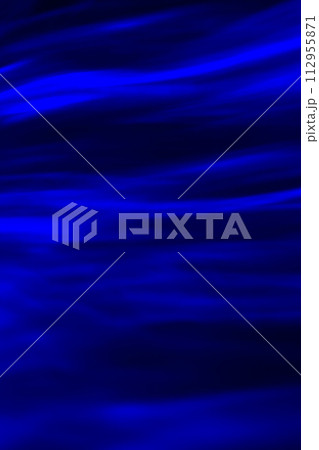 Defocused abstract blue background of speed camera movement over glowing lights. A pattern of flashes of light similar to the northern lights 112955871