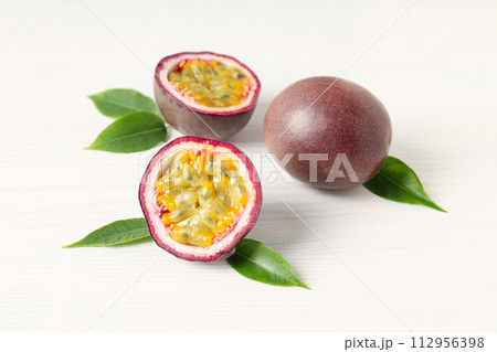 Concept of delicious and juicy exotic fruit - passion fruit 112956398