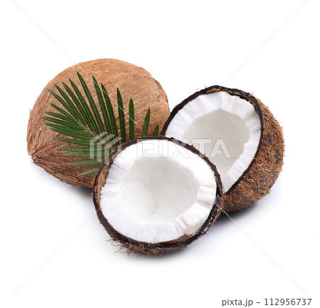 Coconut with leaves on white backgrounds Coconut with leaves on white backgrounds 112956737