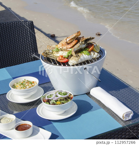 Vegan Yoga Girl Holds Healthy Whole Foods Plant Based Meal with Colorful Greens Quinoa Next to Swimming Pool Vegan Yoga Girl Holds Healthy Whole Foods Plant Based Meal with Colorful Greens Quinoa Next to Swimming Pool 112957266