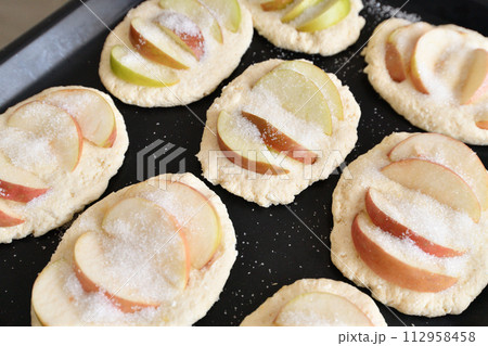 Raw curd cheesecakes with an apples Raw curd cheesecakes with an apples 112958458