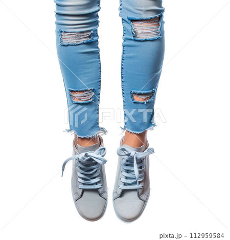 AI-generated content. Female legs in jeans and sneakers 112959584