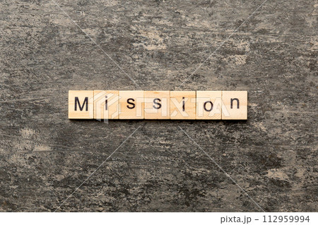 MISSION word written on wood block. MISSION text on table, concept MISSION word written on wood block. MISSION text on table, concept 112959994