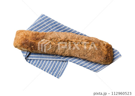 Freshly baked delicious french bread with napkin isolated on white background top view. Healthy white bread loaf Freshly baked delicious french bread with napkin isolated on white background top view. Healthy white bread loaf 112960523