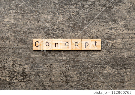 Concept word written on wood block. Concept text on table, concept Concept word written on wood block. Concept text on table, concept 112960763