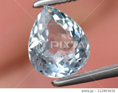 natural blue aquamarine gemstone on the background 112963610