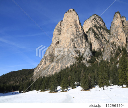 Majestic peaks seen from the Langental Valley near Wolkenstein, South Tirol. Majestic peaks seen from the Langental Valley near Wolkenstein, South Tirol. 112965304