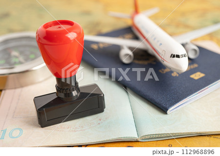 Approved Stamp visa and passport document to immigration at airport in country. Approved Stamp visa and passport document to immigration at airport in country. 112968896