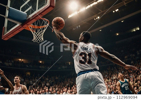 Active basketball players in action, holding the ball, competing in a game with energy and enthusiasm Active basketball players in action, holding the ball, competing in a game with energy and enthusiasm 112969094