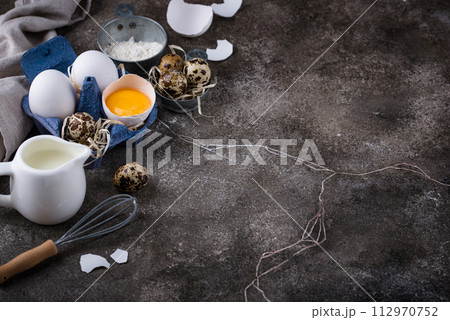 Baking ingredients with flour and eggs 112970752