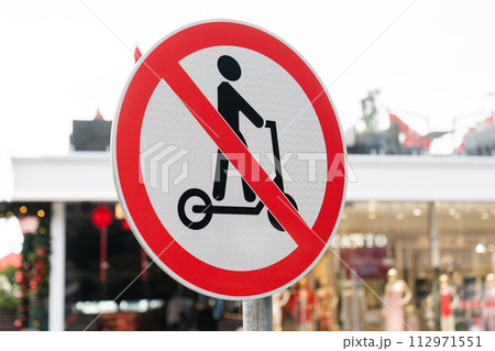 Road sign prohibiting riding electric scooters. Road sign prohibiting riding electric scooters. 112971551